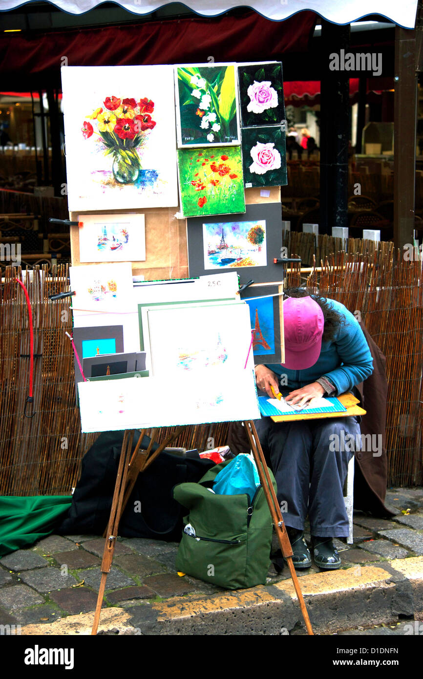 Artiste de rue travaillant dans la Place du Tertre, Montmartre Paris France Europe Banque D'Images