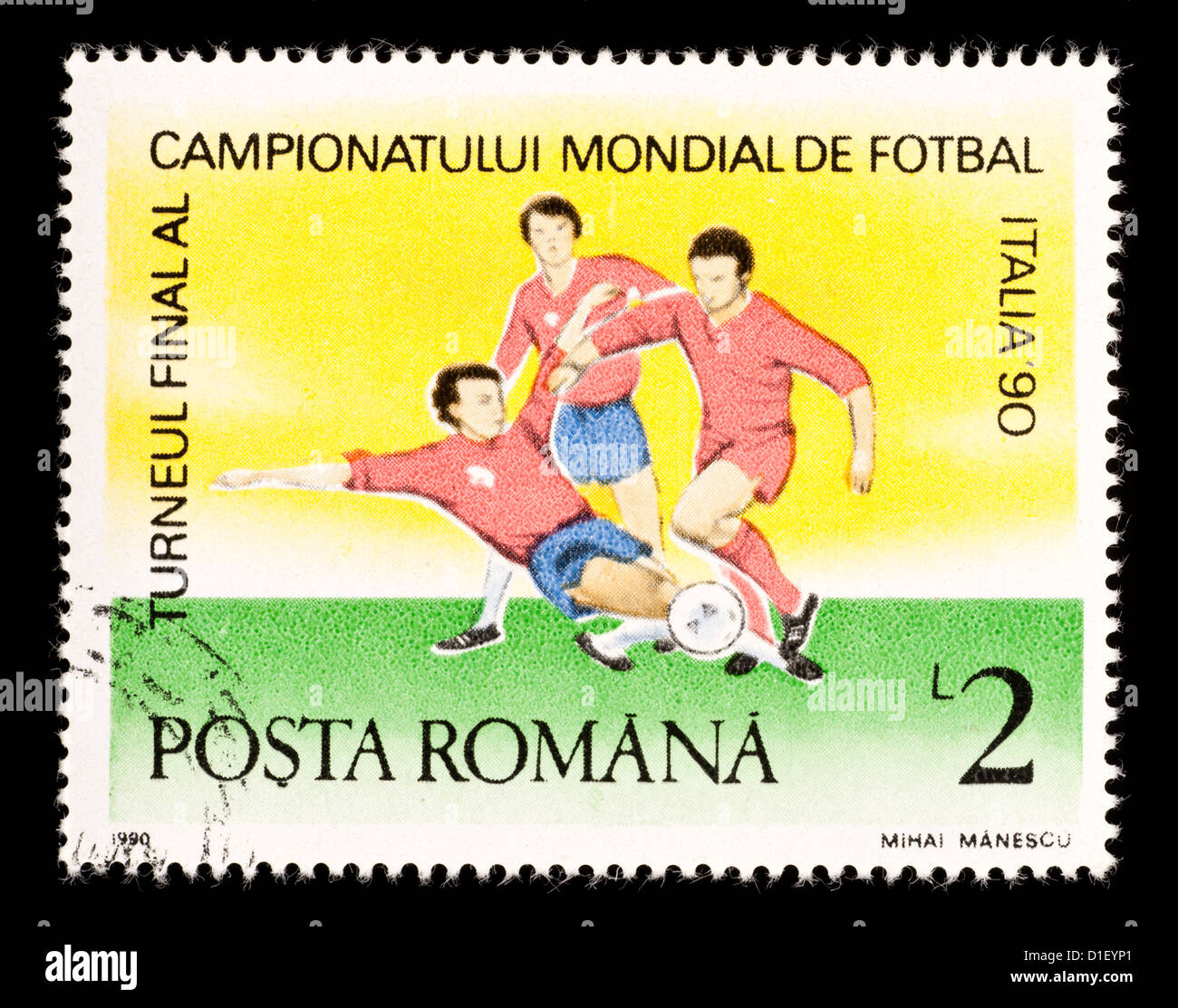 Timbre-poste de Roumanie représentant des joueurs de football, émis pour la Coupe du Monde 1990 en Italie. Banque D'Images