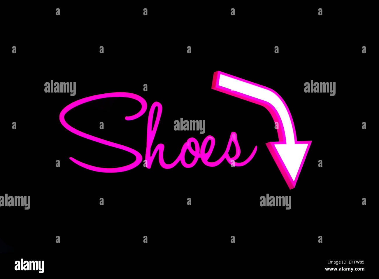 Chaussures signe avec flèche vers le frisé Banque D'Images