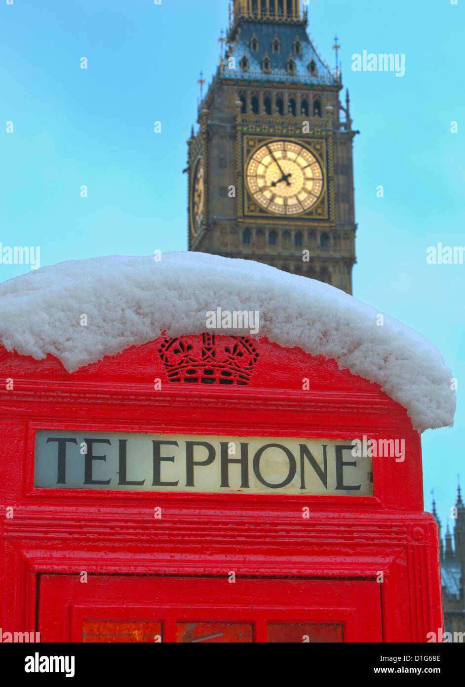 Boîte de téléphone rouge et Big Ben dans la neige, la place du Parlement, Londres, Angleterre, Royaume-Uni, Europe Banque D'Images