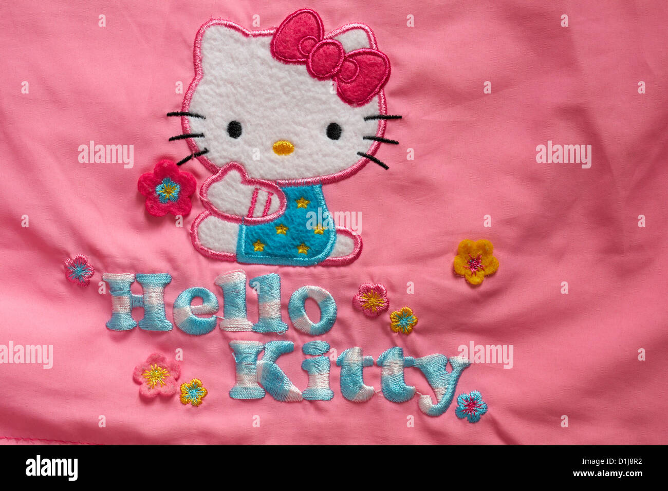 Détails Hello Kitty sur girl's coat close up Banque D'Images