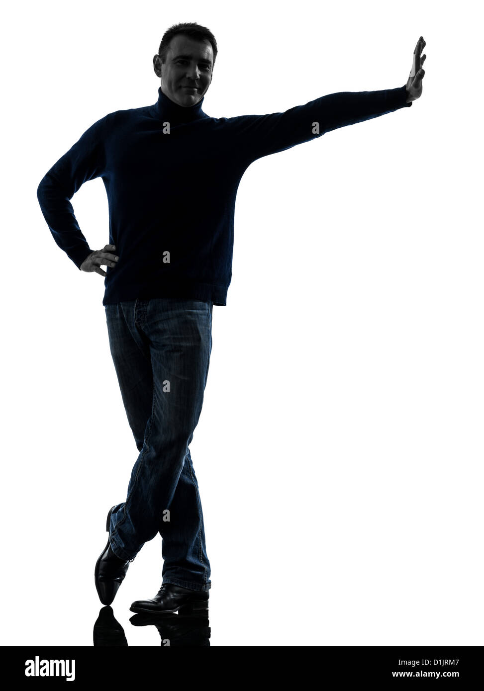 One man smiling friendly full length en silhouette studio isolé sur fond blanc Banque D'Images