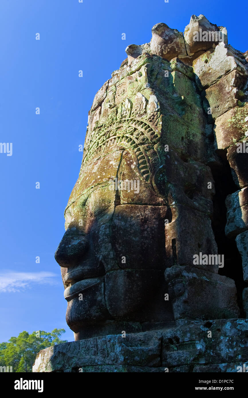 Sculpture tête de pierre à Angkor Thom Banque D'Images