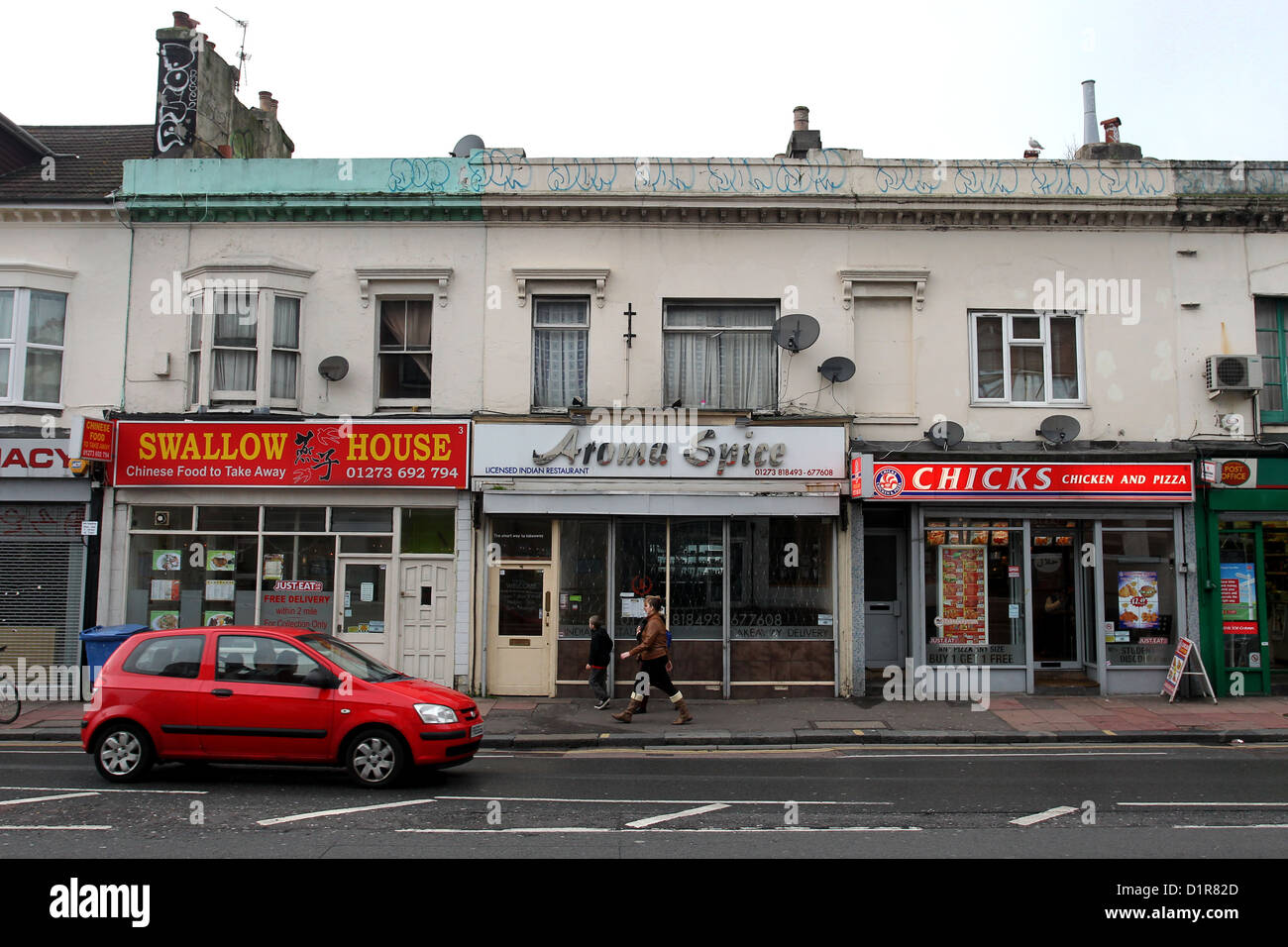 À emporter et de restauration rapide côte à côte à Lewes Road, Brighton, East Sussex, UK. Banque D'Images