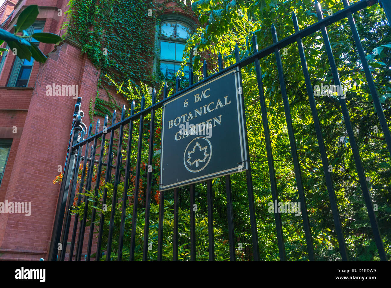 New York, East Village, E. 6e rue 'Jardin Botanique', jardins communautaires, signe sur Barrière, quartiers locaux Banque D'Images