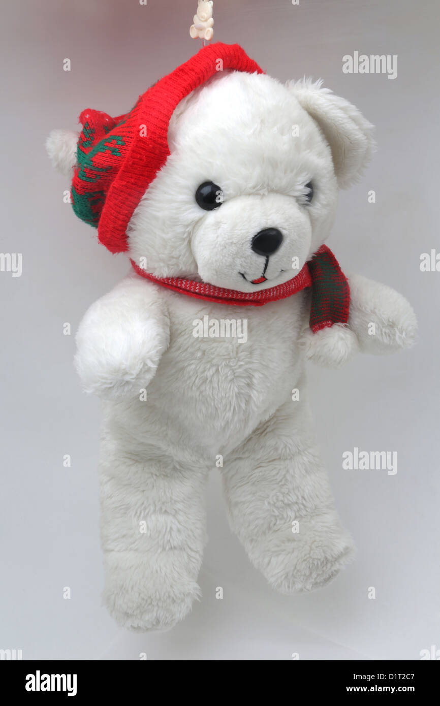 Noël blanc Teddy Bear Wearing Hat And Scarf Banque D'Images