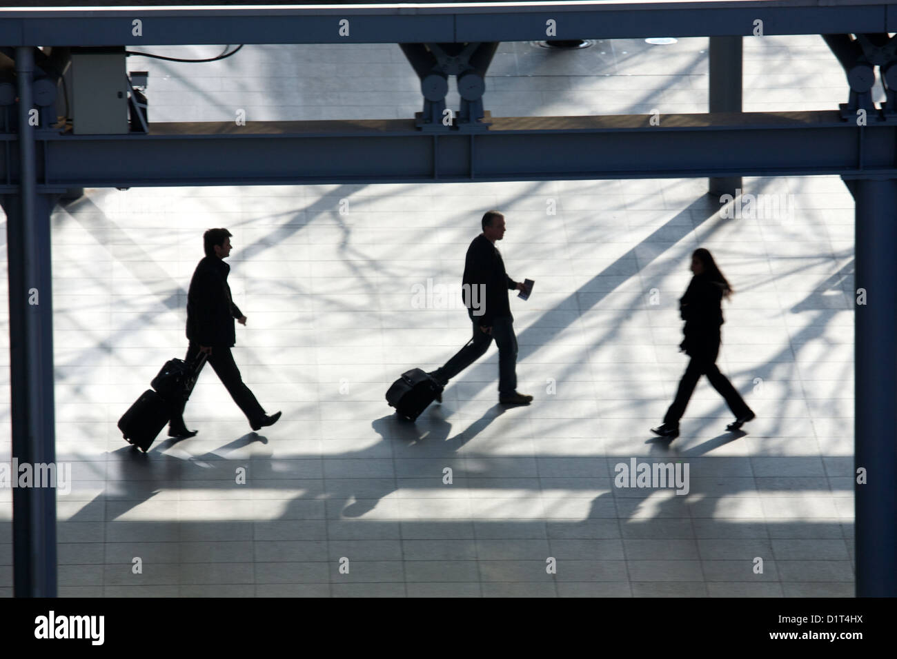 Trois voyageurs en silhouette Banque D'Images