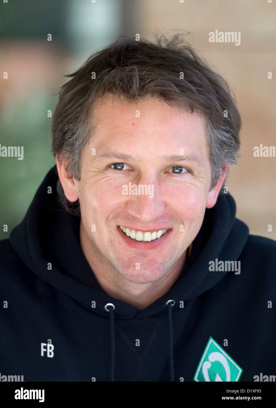 Le Werder Brême est le Scoutisme et le football professionnel, Frank Baumann sourit lors d'une conférence de presse au cours de l'hiver camp d'entraînement à Belek, Turquie, 07 janvier 2013. PHOTO : SOEREN STACHE Banque D'Images