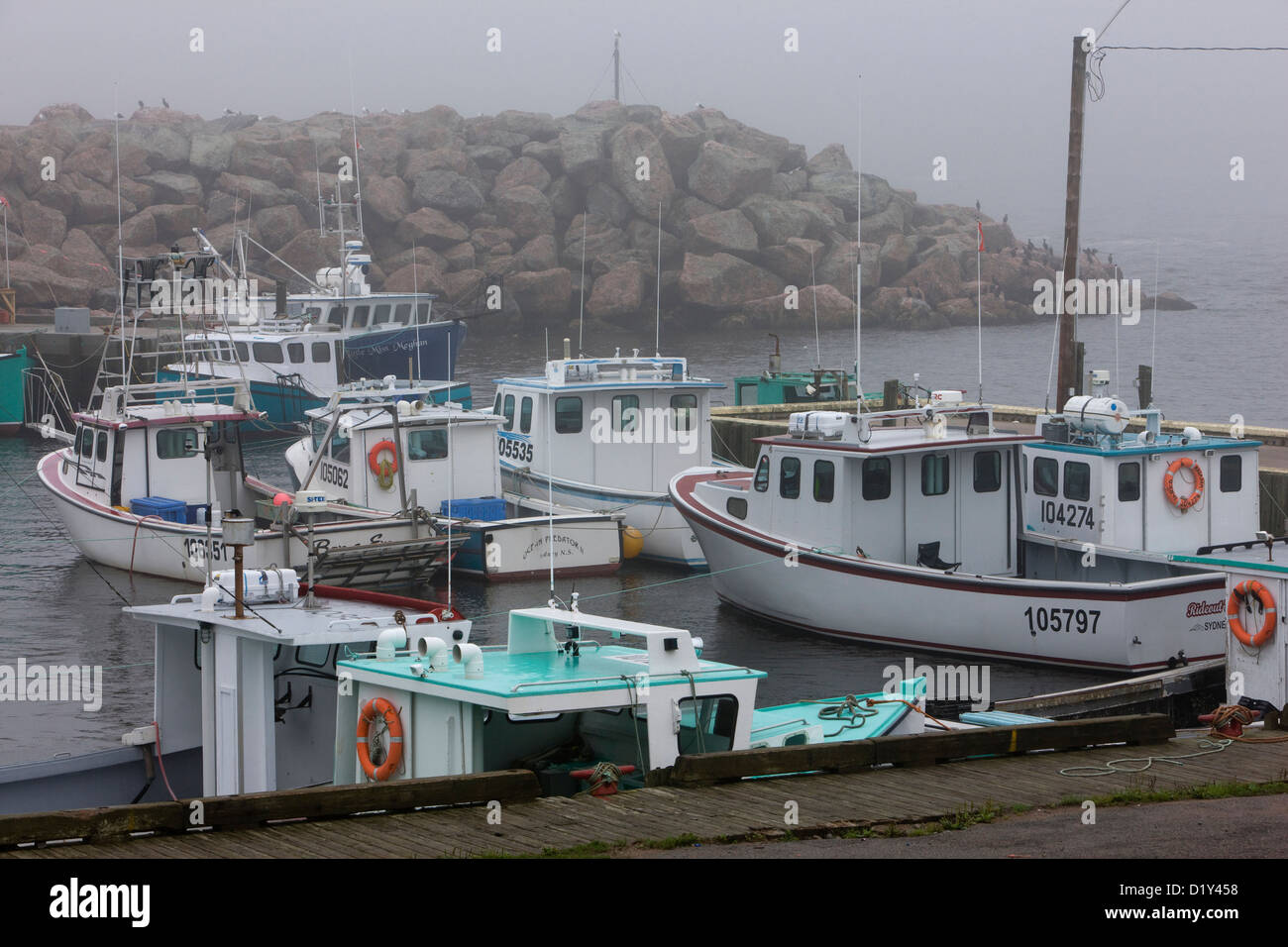 Les bateaux de pêche à Neil's Harbour, île du Cap-Breton, Nouvelle-Écosse Banque D'Images