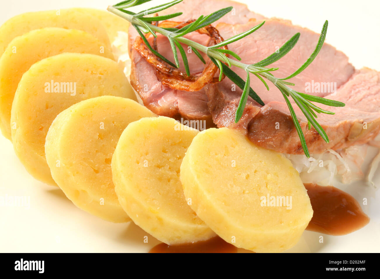 Porc aux boulettes de pommes de terre Banque D'Images