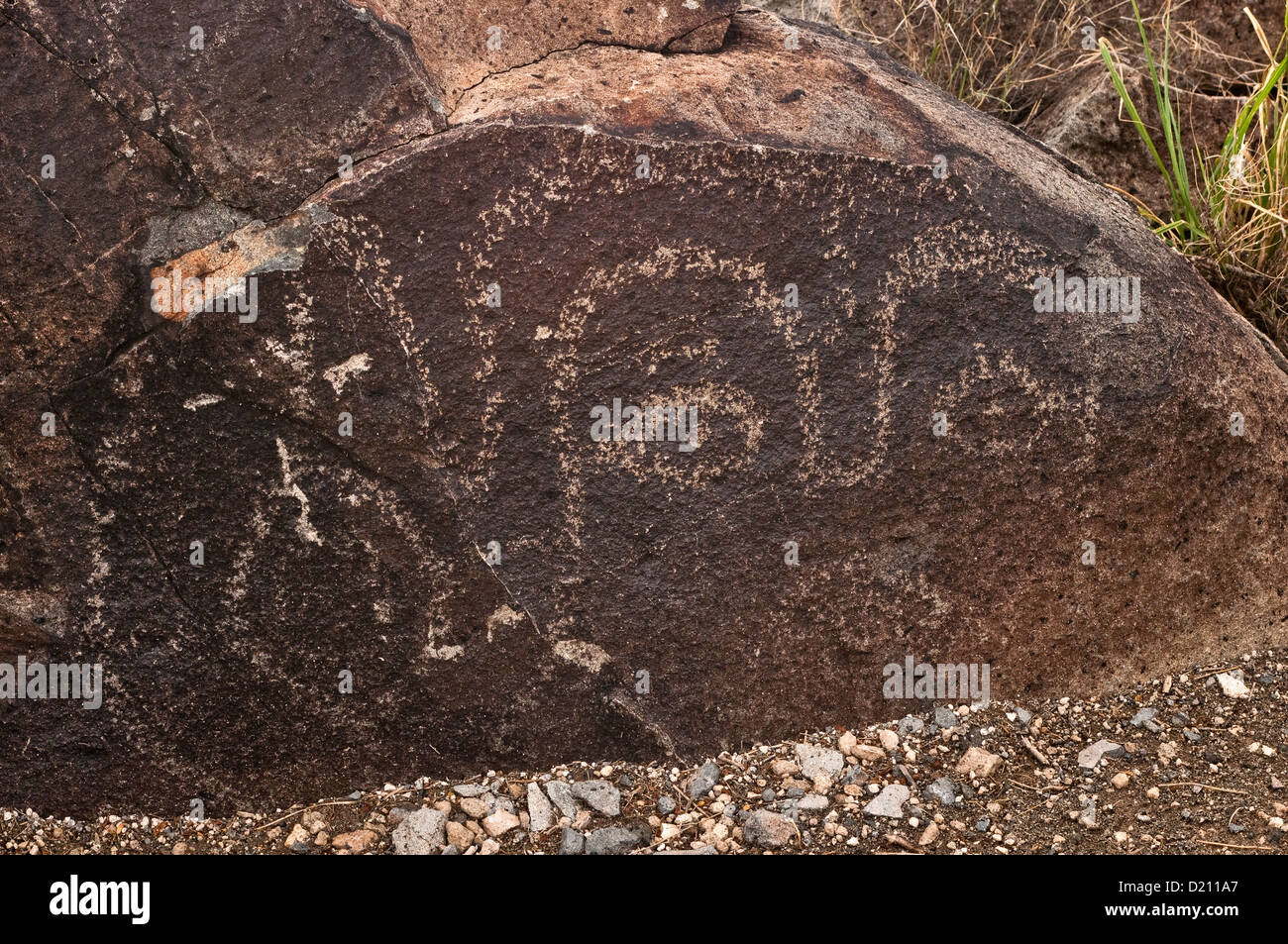 Face à Jornada Mogollon style rock art aux Trois Rivières Site de pétroglyphes, Désert de Chihuahuan près de la Sierra Blanca, New Mexico, USA Banque D'Images