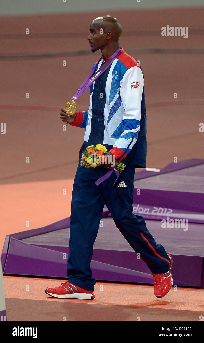 Mo Farah (GBR, Grande-Bretagne) avec sa médaille d'or. Athlétisme Banque D'Images