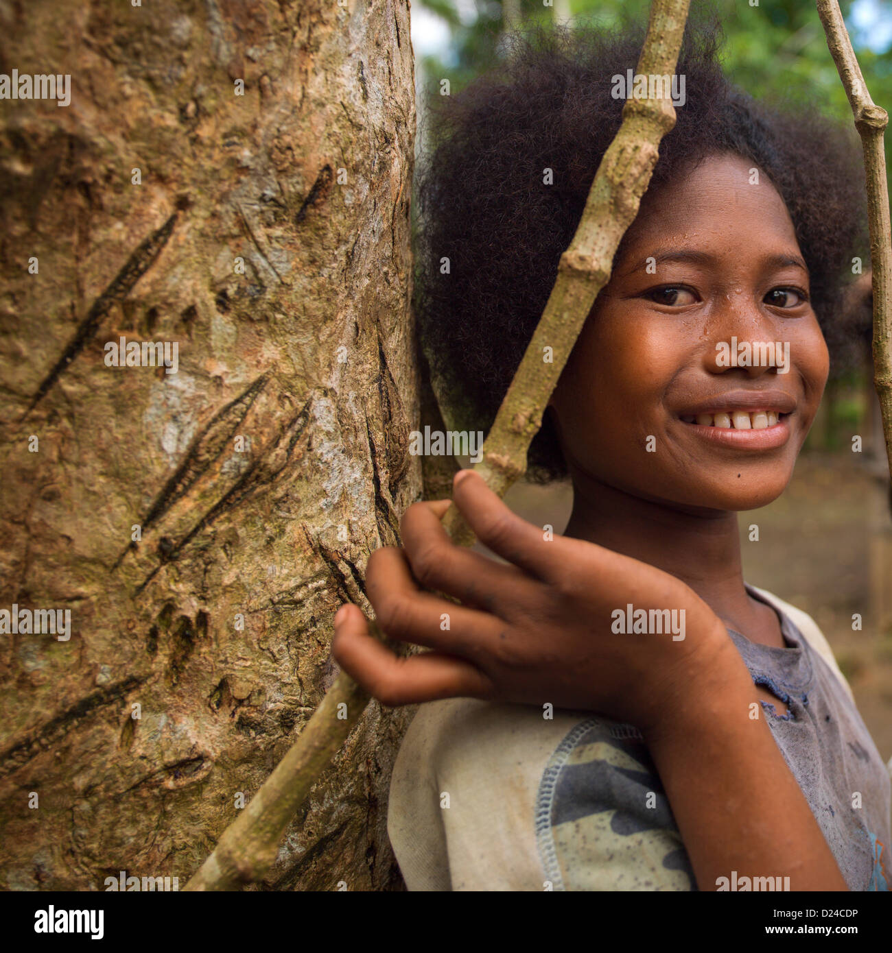 Young Girl Smiling, île Trobriand, Papouasie Nouvelle Guinée Banque D'Images