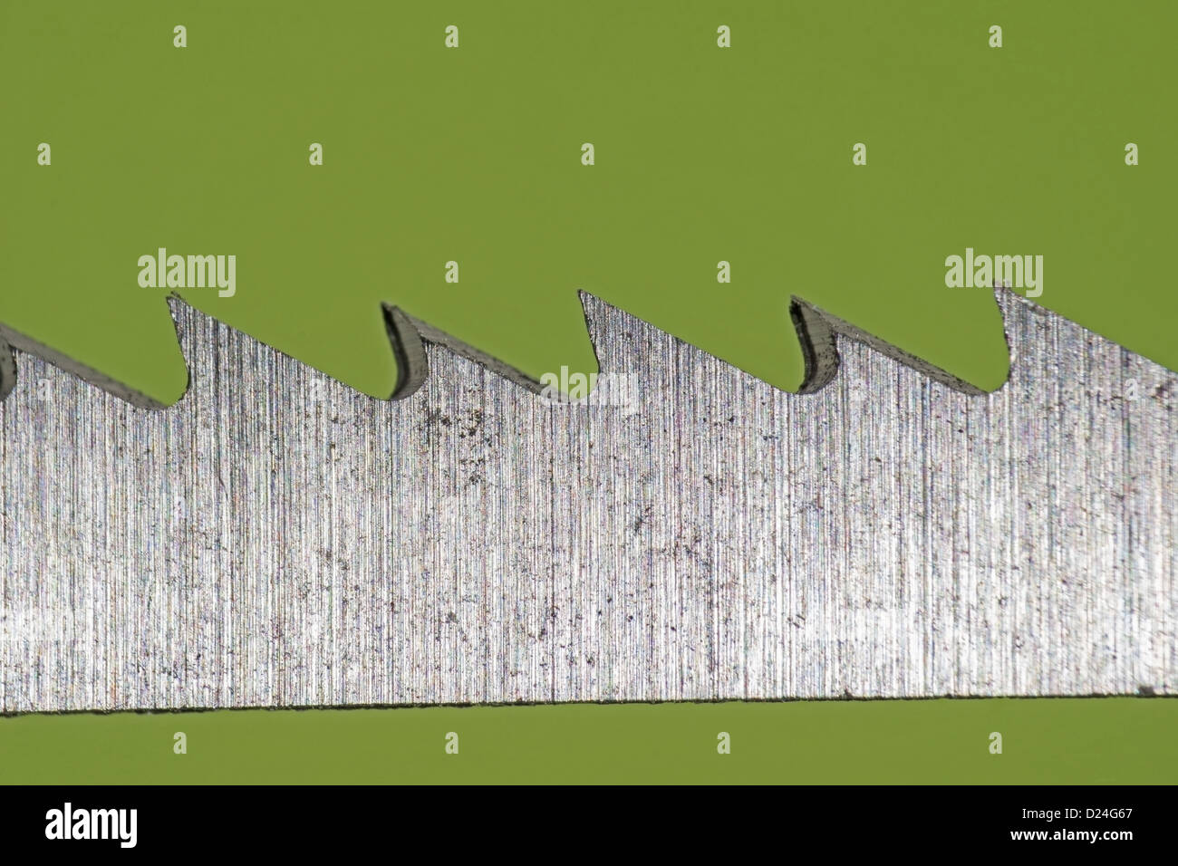 Plan macro sur une lame de coupe utilisée dans un puzzle power tool Banque D'Images