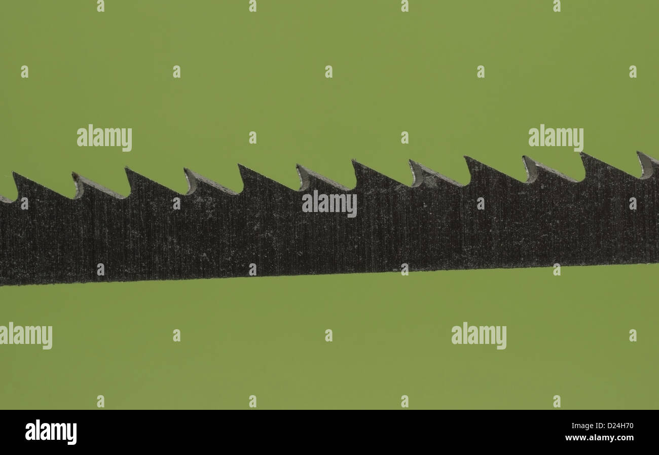 Plan macro sur une lame de coupe utilisée dans un puzzle power tool Banque D'Images