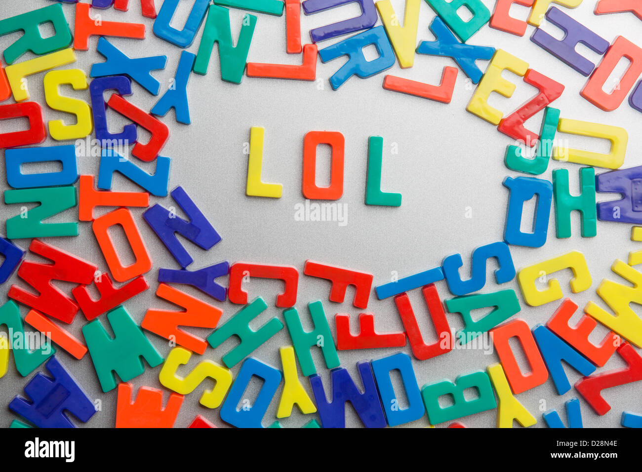 'LOL' - aimants pour réfrigérateur messages sort sur un fouillis de lettres Banque D'Images