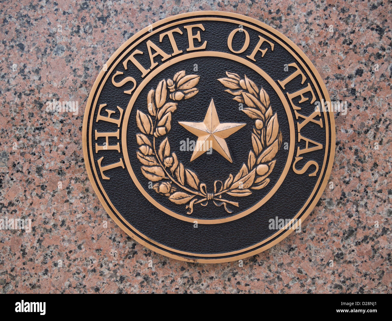 Le sceau de l'État du Texas sur la plaque de granit rose Texas Banque D'Images