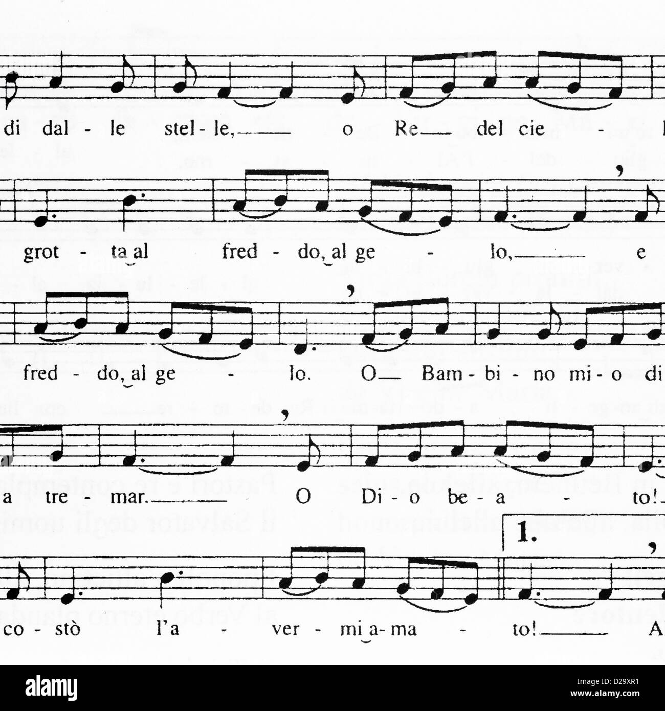 Libre de la musique en feuille avec des notes et des mots pour le chant de Noël traditionnel "Tu scendi dalle stelle" Banque D'Images