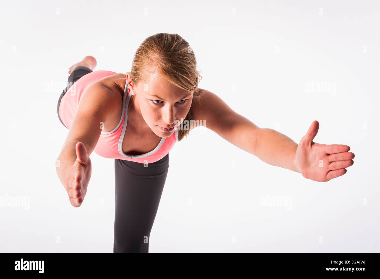 Woman practicing yoga Banque D'Images