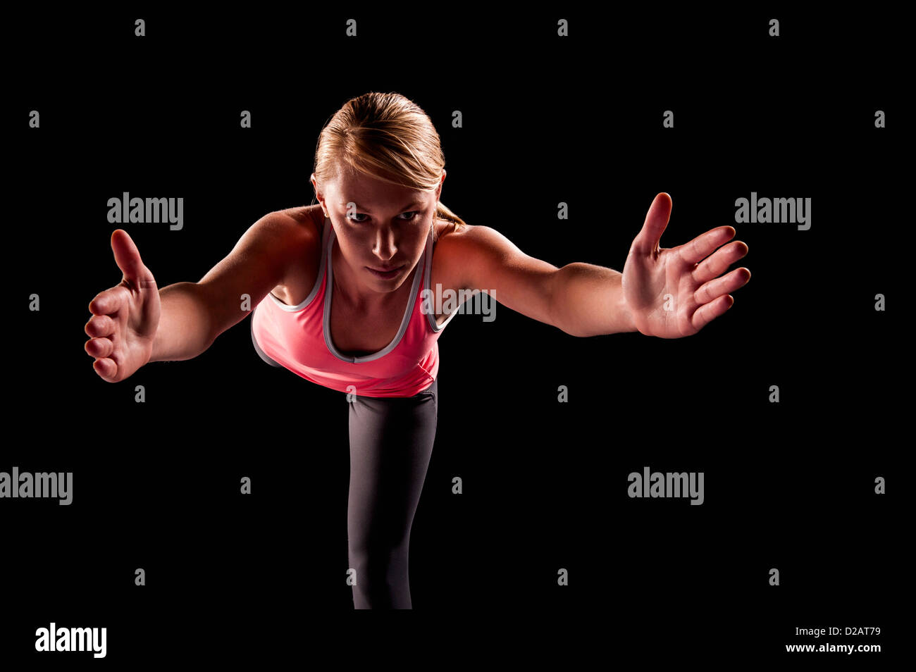 Woman practicing yoga Banque D'Images