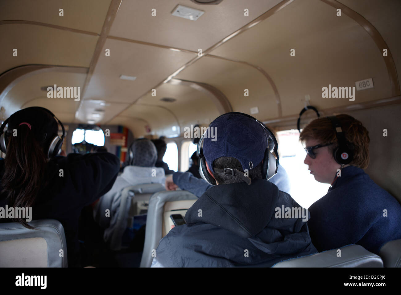 Les passagers à bord de petits avions Twin Otter dehaviland vol touristique à grand canyon Banque D'Images