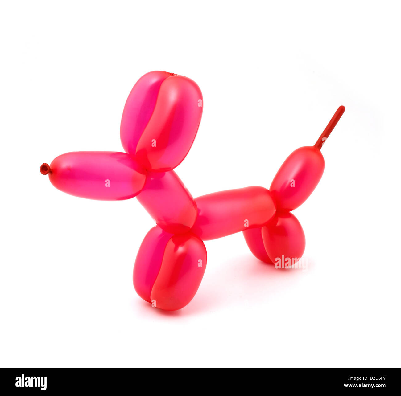 Ballon rouge en forme de chien découper fond blanc Banque D'Images