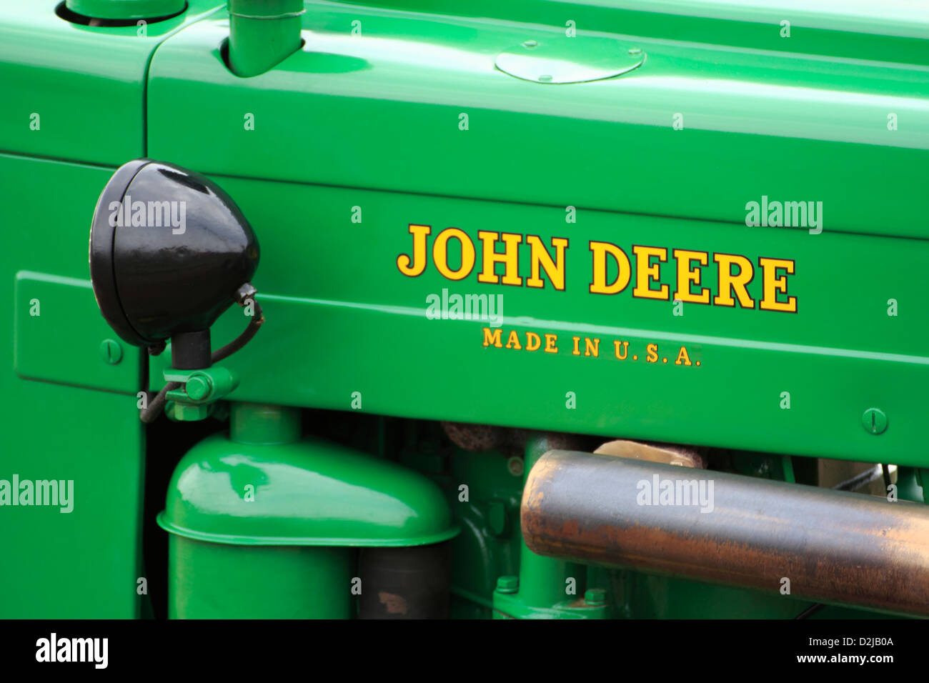 Tracteur John Deere badge étiquette nom sur un tracteur Banque D'Images