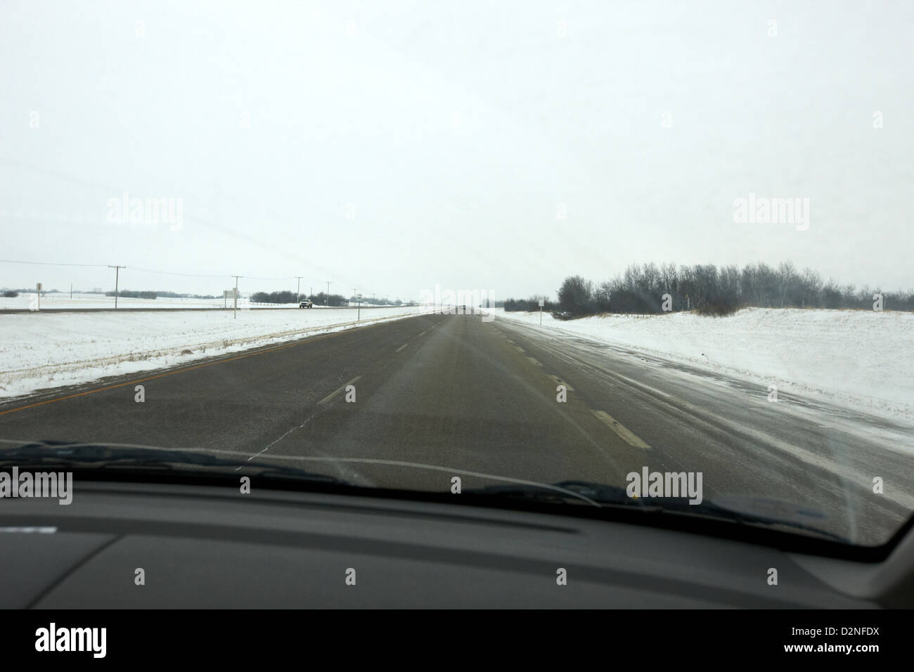 La conduite en hiver le long de la route 11 de la Saskatchewan à Saskatoon et Regina Canada Banque D'Images