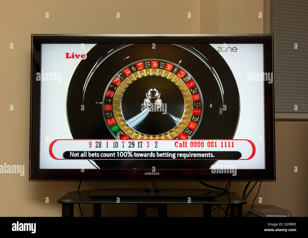 Écran de télévision montrant la roue de roulette en jeu télévisé UK Banque D'Images