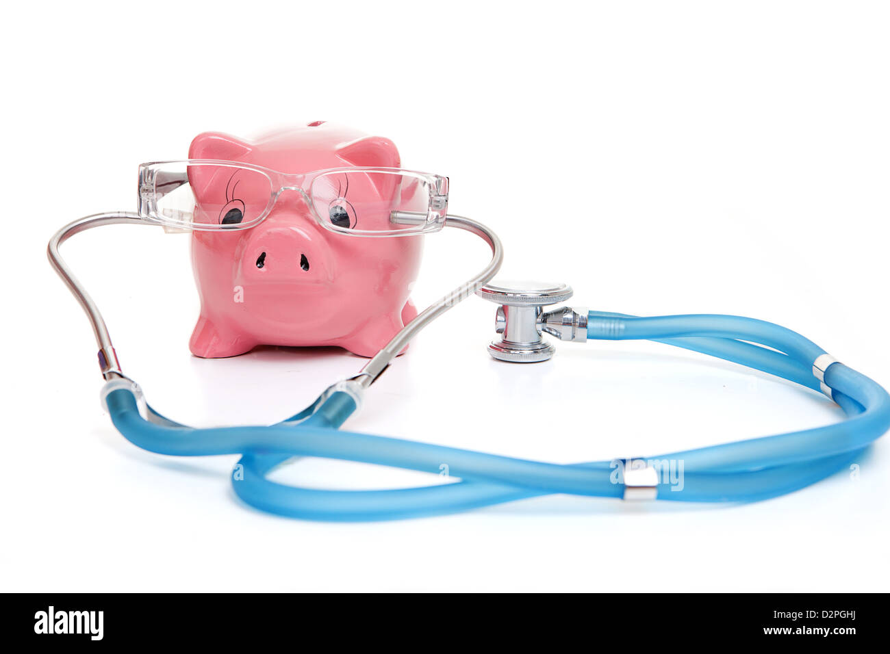 Concept de l'assurance médicale avec de l'argent et verres stéthoscope Banque D'Images