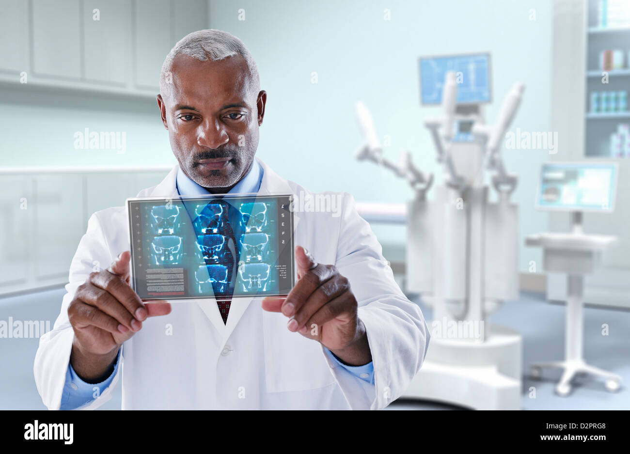 Black doctor looking at digital tablet Banque D'Images Black doctor looking at digital tablet Banque D'Images