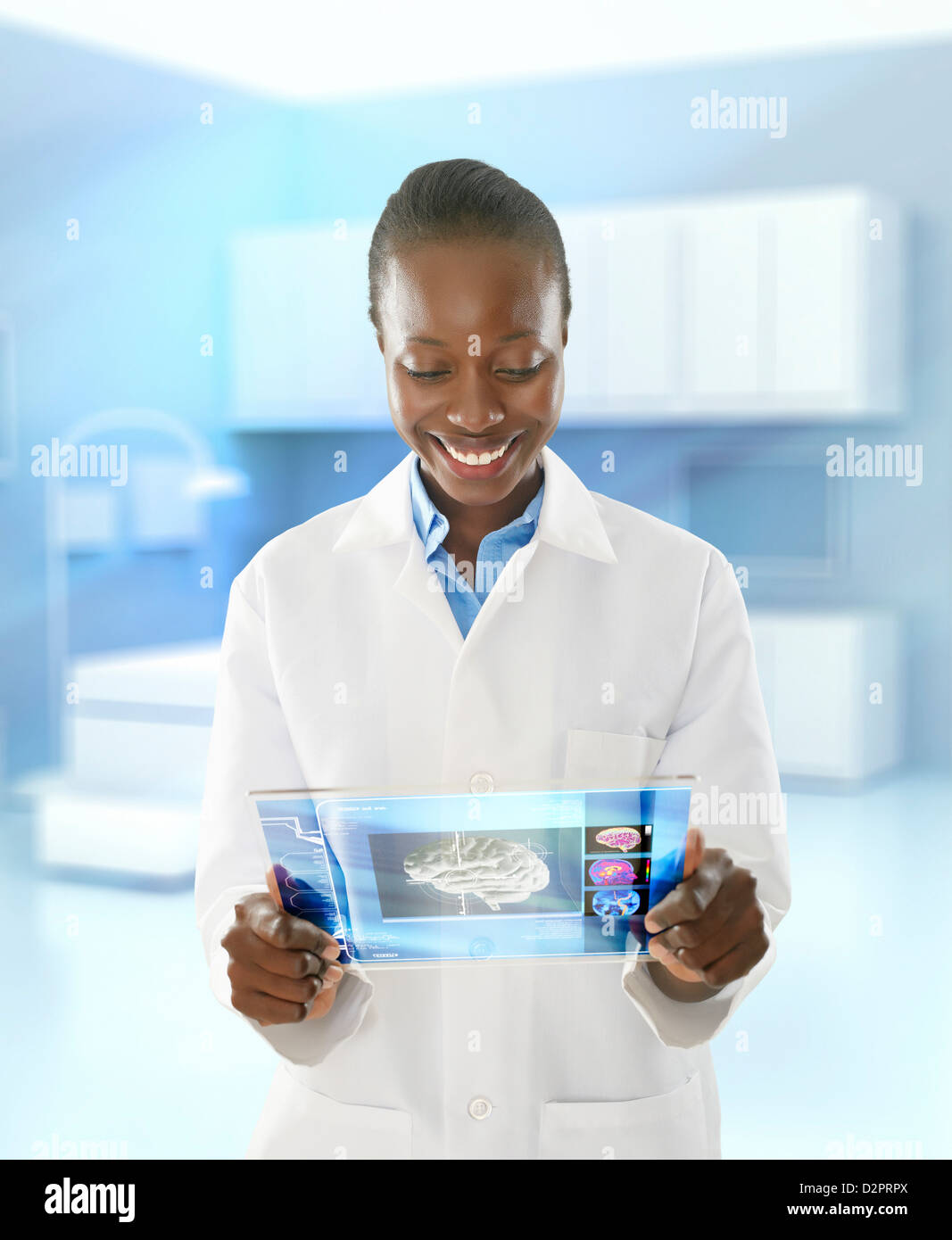 African American doctor using digital tablet in doctor's office Banque D'Images