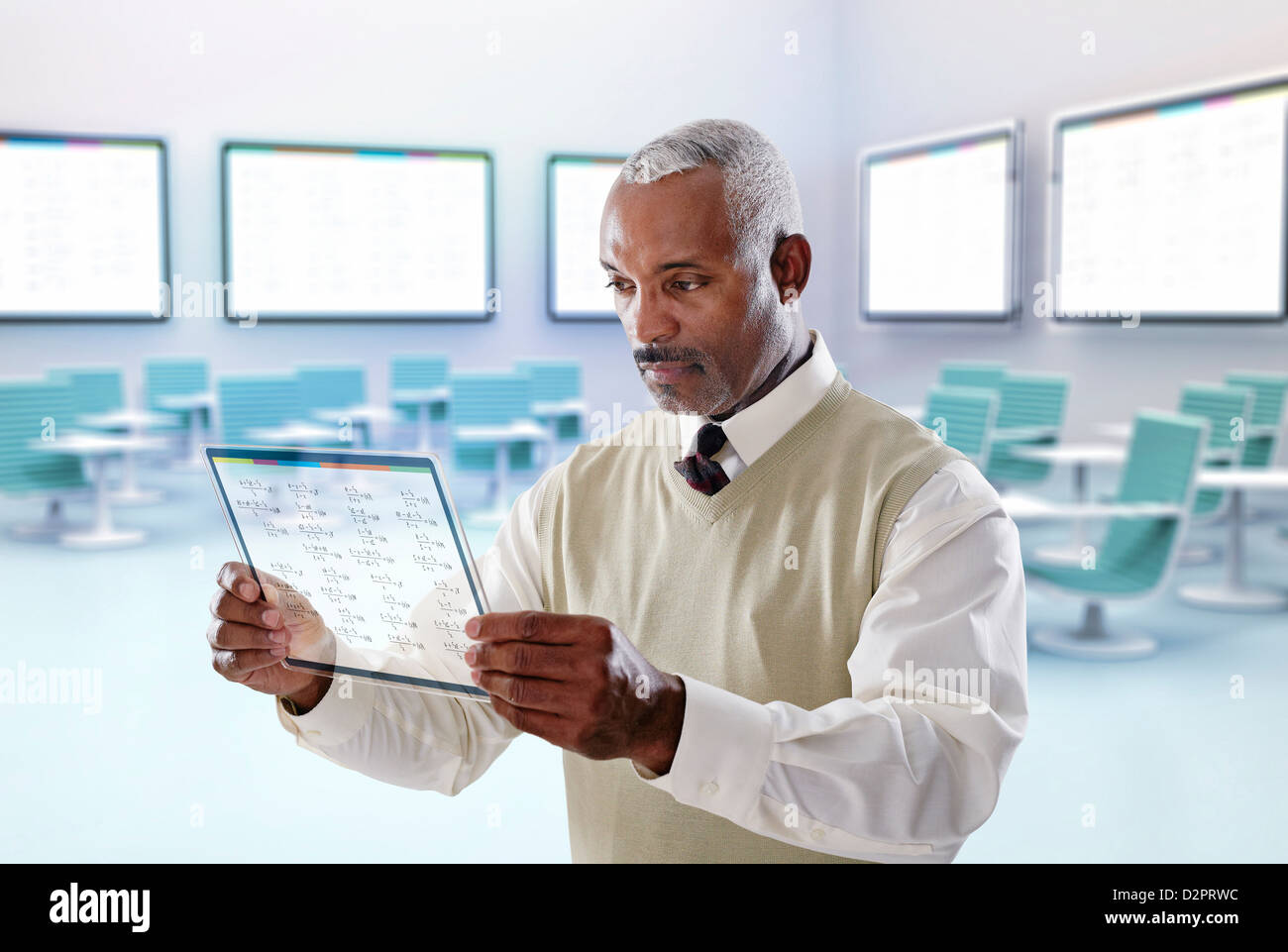 Black businessman using digital tablet in conference room Banque D'Images