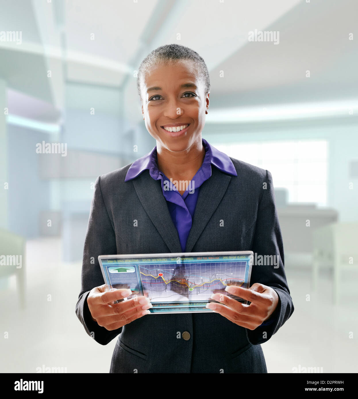 Black businesswoman using digital tablet in office Banque D'Images