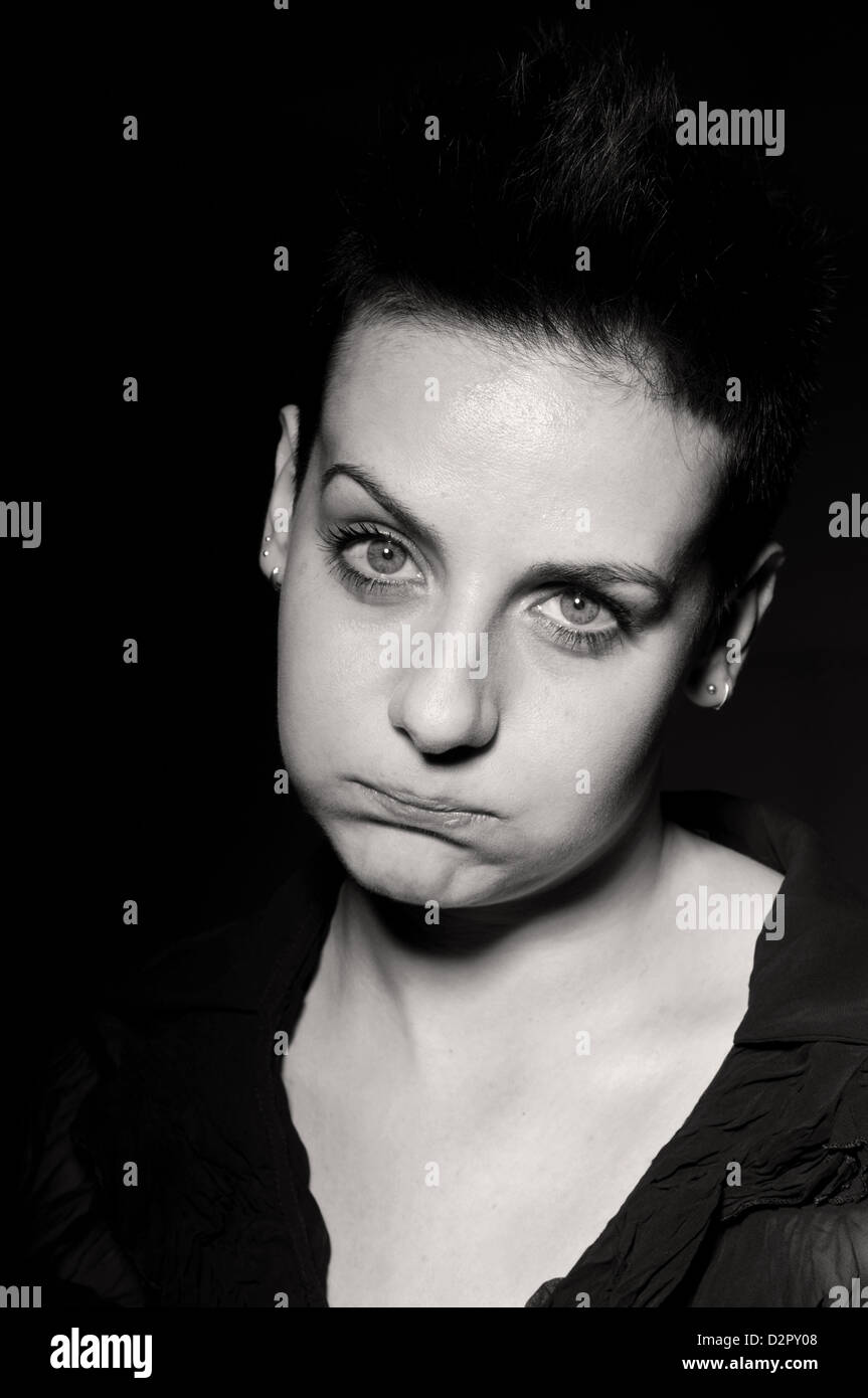 Du vrai jeune femme avec des expressions du visage inconsolable Banque D'Images