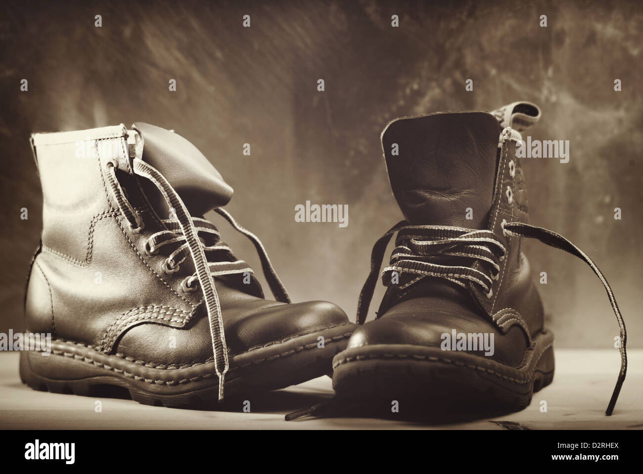 Vieilles chaussures close up shot contre origines grunge Banque D'Images