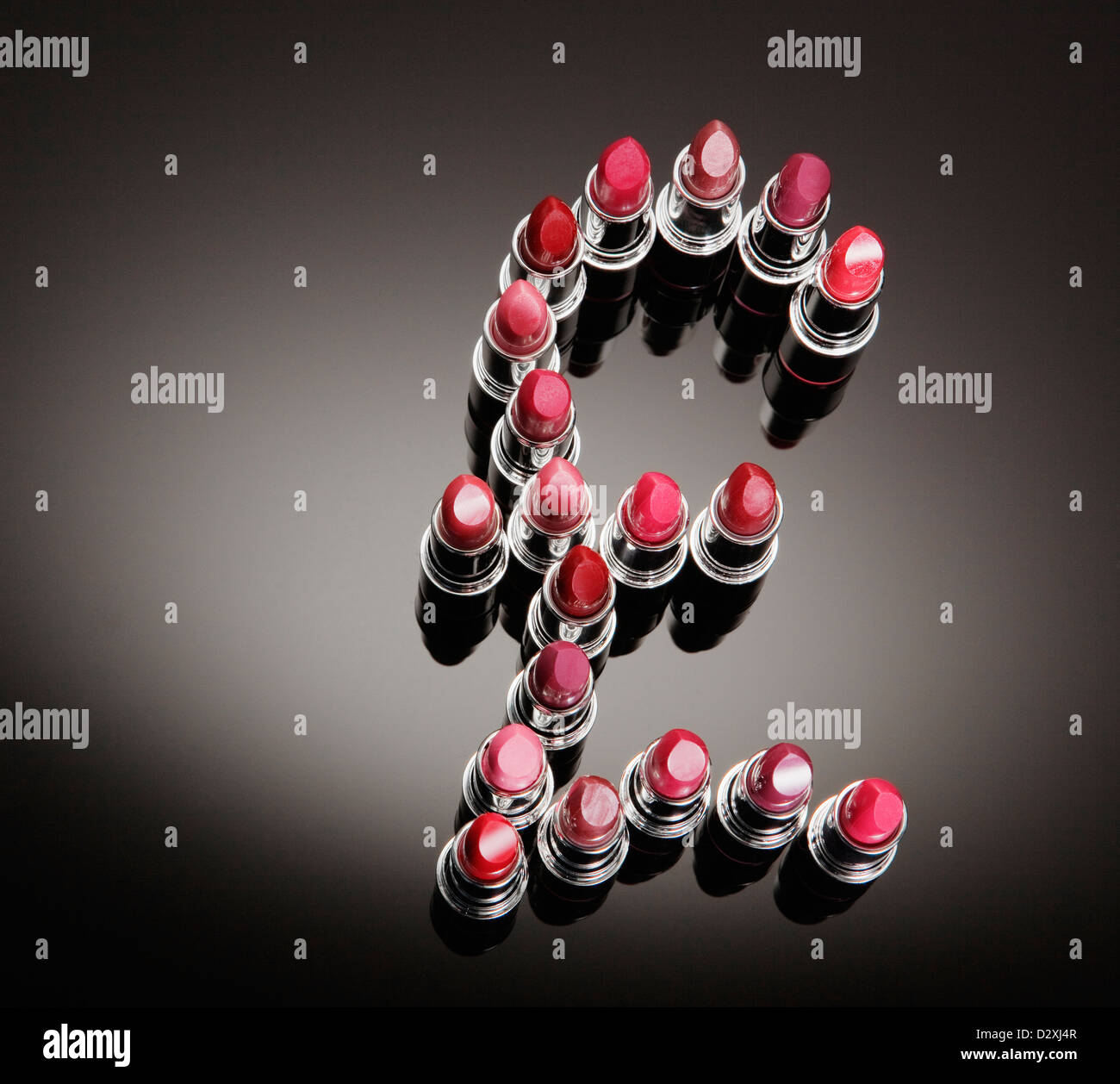Multicolor lipsticks forming British pound symbol Banque D'Images