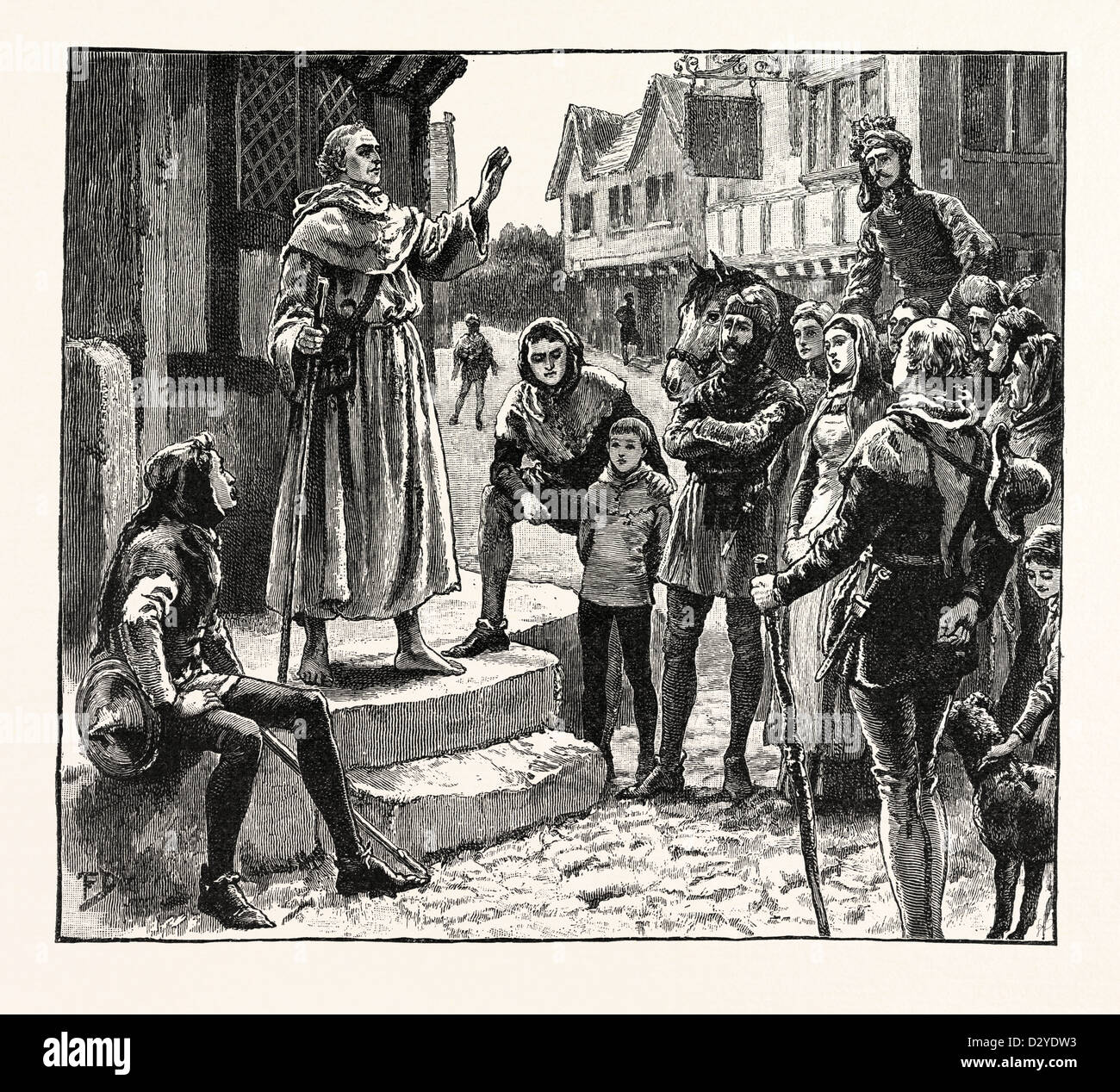 L'UN DES PRÊTRES PAUVRES DU WYCLIFFE PRÊCHE À DES PERSONNES Banque D'Images