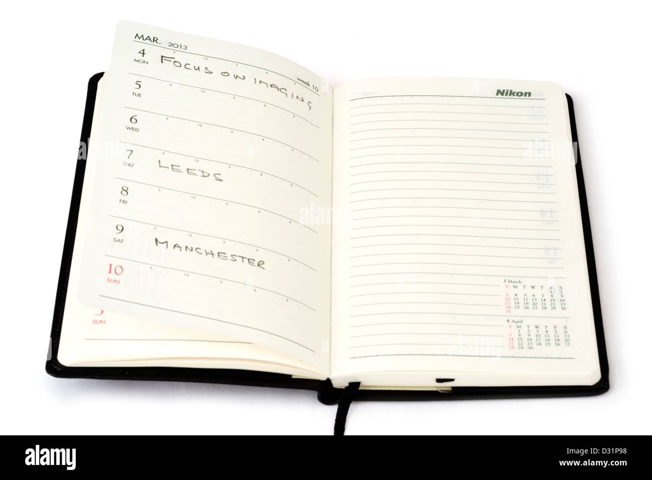 Dates dans Pocket Diary Banque D'Images