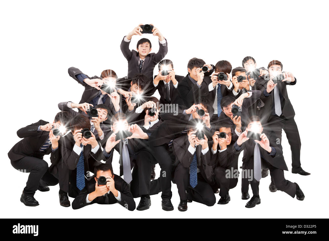 De nombreux photographes holding camera pointant vers vous et isolated on white Banque D'Images