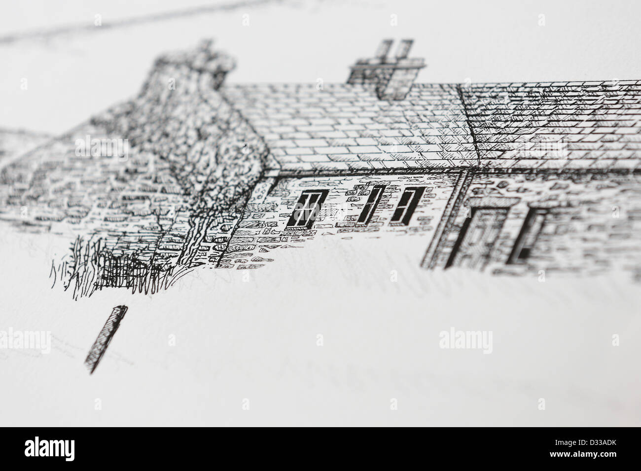 Artiste dessin / croquis dans studio plume et encre dessin de vieille architecture cottage écossais dans les îles Orcades. Banque D'Images