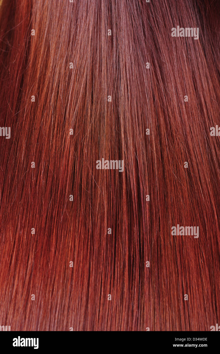 Belle texture des cheveux brillants sains rouge Banque D'Images