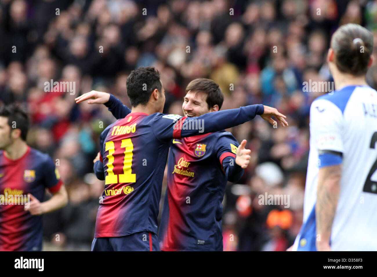 10.02.2013. Barcelone, Espagne. Thiago et Messi célèbrent le deuxième but au cours de la La Liga match entre Barcelone et Getafe du Nou Camp. Banque D'Images