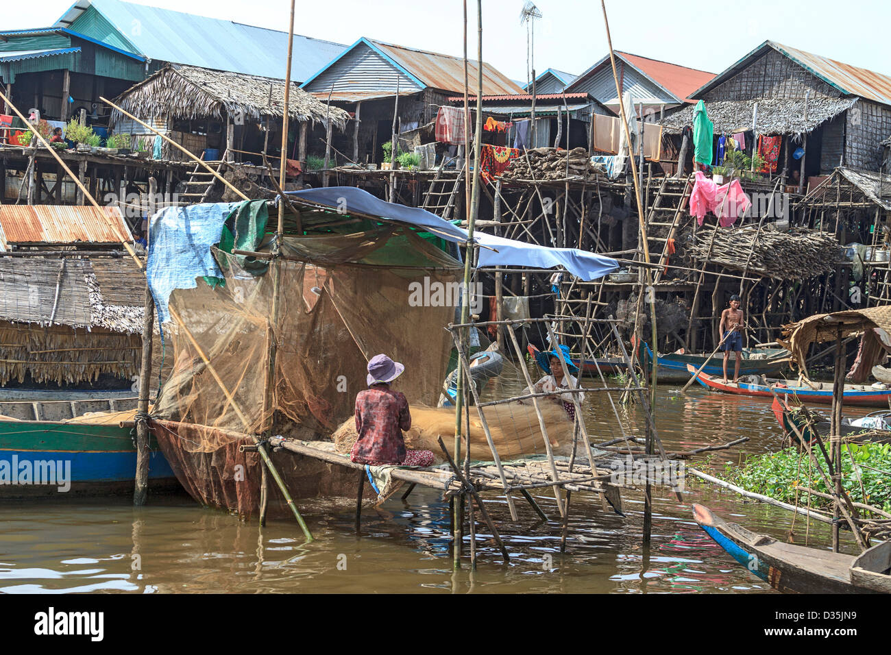 Poisson dans les filets de peche Banque de photographies et d’images à haute résolution Alamy