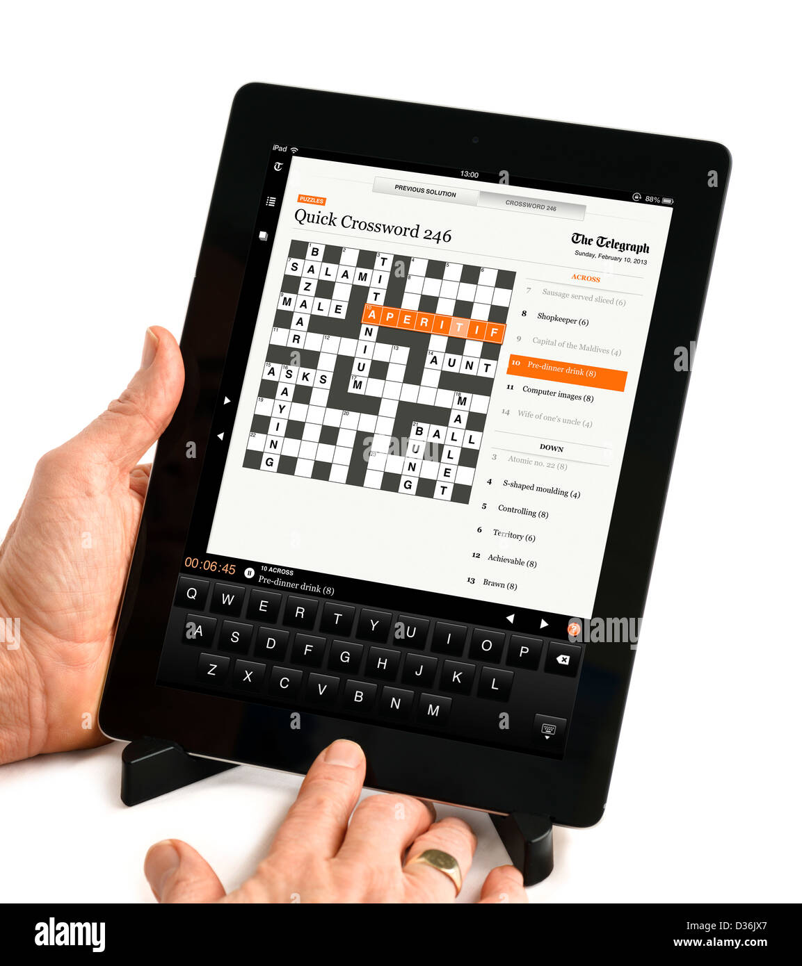 Les mots croisés sur la Doint Telegraph app sur un Apple iPad retina 4ème  genration tablet computer Photo Stock - Alamy