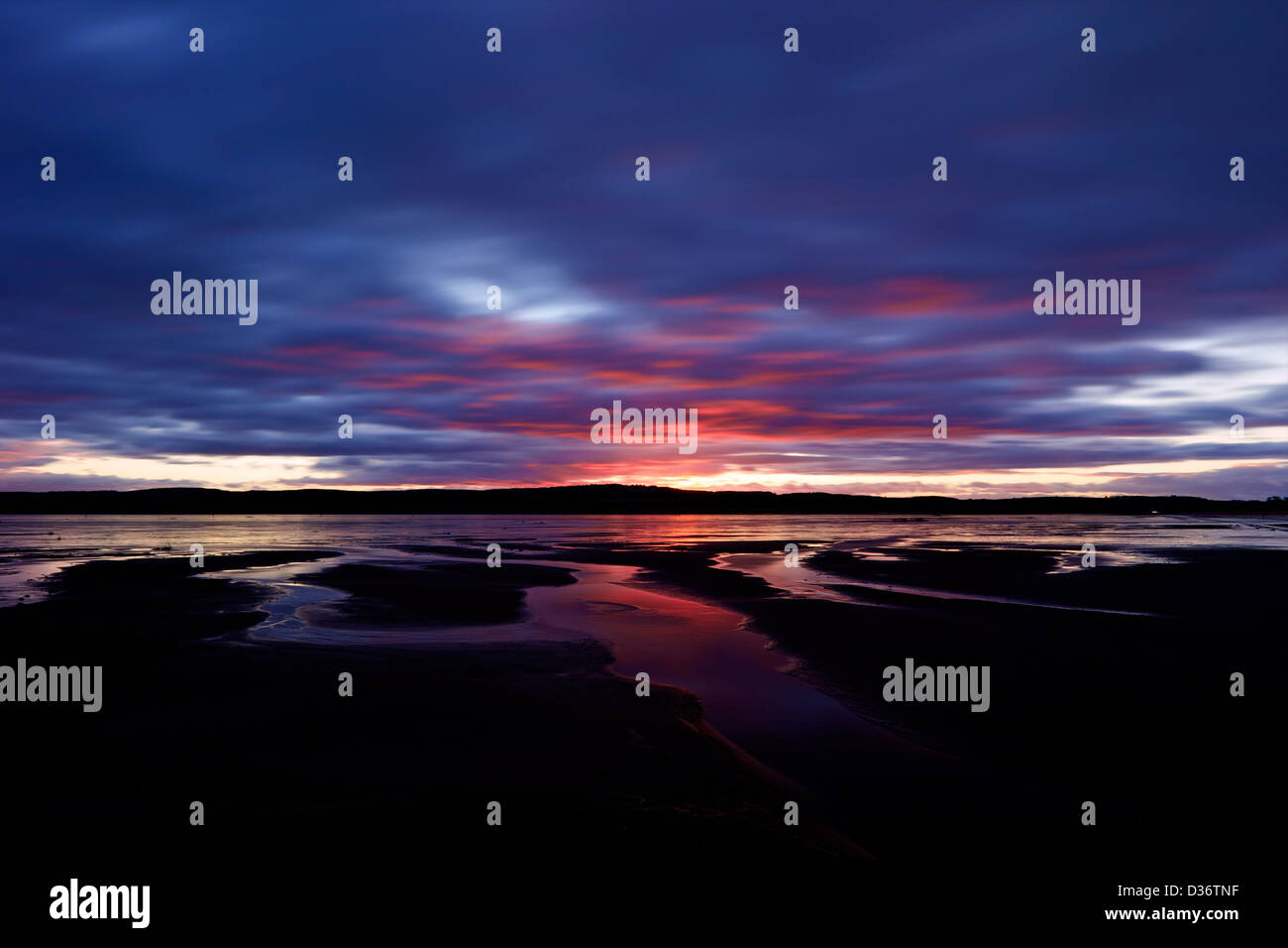 Le coucher du soleil, au nord-est de Northumberland Lindisfarne, England, UK, FR Banque D'Images
