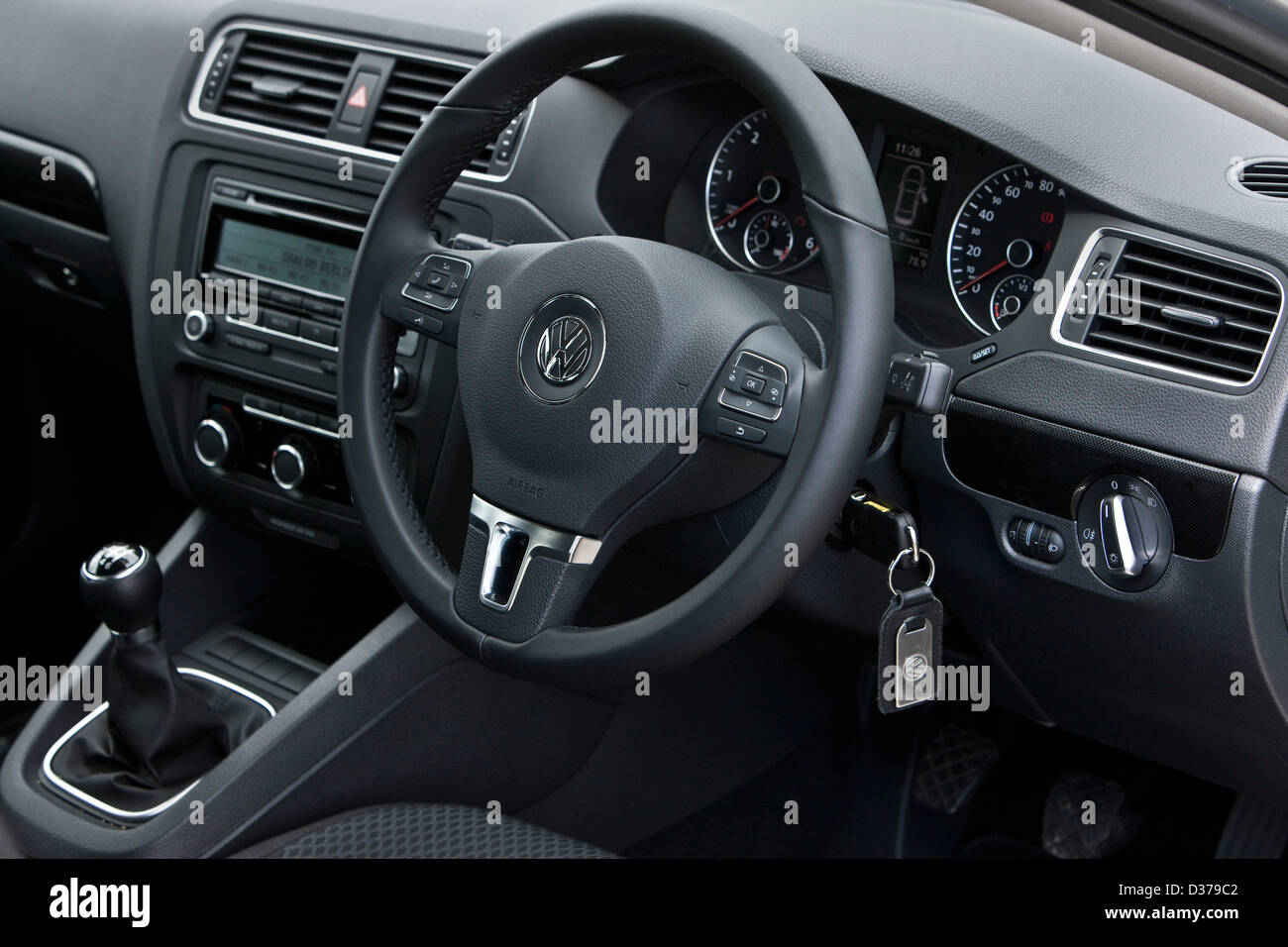 Volant de direction avec clé dans le contact, VW Jetta moyennes des voitures allemandes, Southampton, UK 136 2011 Banque D'Images