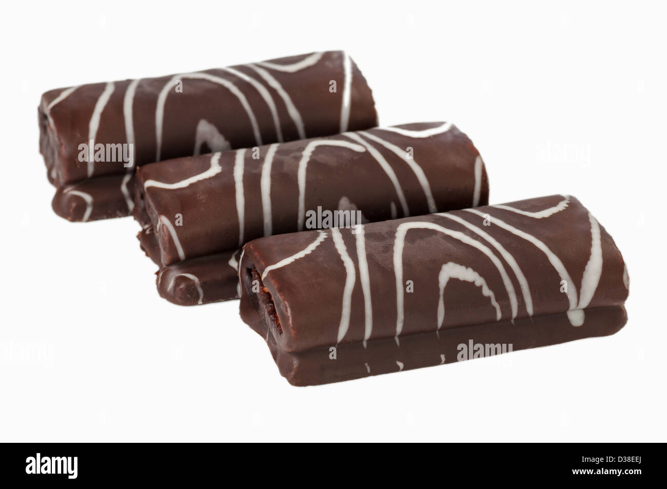 Chocolat blanc trois rouleaux sur isolé Banque D'Images