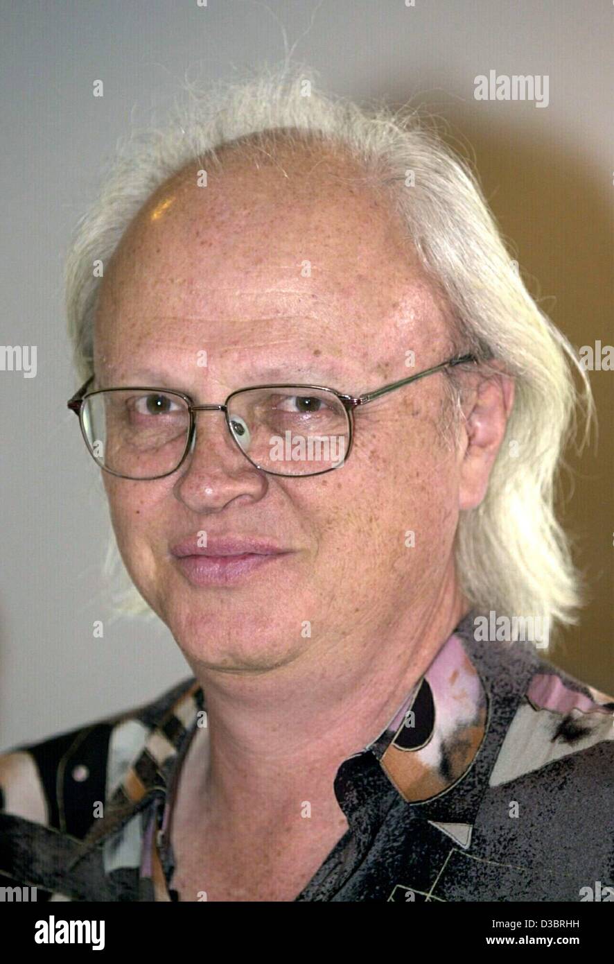 (Afp) - Dennis Muren, spécialiste pour nous Trucs et astuces film et des effets spéciaux ('Star Wars : Episode I', 'Jurassic Park', 'Terminator 2'), producteur et réalisateur est photographié à Francfort, Allemagne, 28 septembre 2003. Banque D'Images