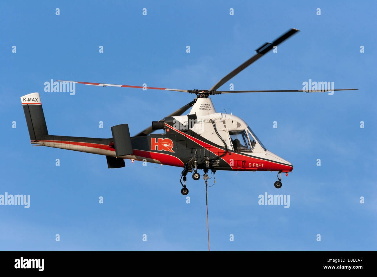 K-MAX k max helicopter longue ligne HeliQuest de travail Banque D'Images
